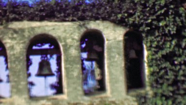 1958: Ivy wrapped ancient church walls hanging bells toll for none.