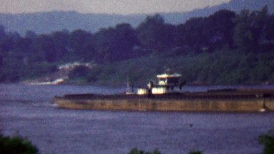 1957: Barge Flatbed Transport Ship Heading Upriver in Rural Virginia