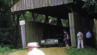 1974: Giant Green Oldsmobile Driving Historic Frasure Covered Bridge