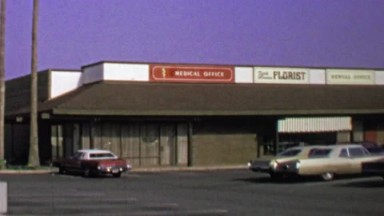 1974: Fifth Avenue Florist Strip Mall Store Classic Car Parking Lot.