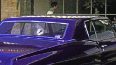 1974: Man open floral shop small business physical store.