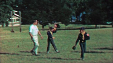 1967: Boy Scouts Kids and Dads Walking Summer Public Park