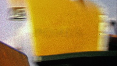 1967: Small carnival rollercoaster ride around festival parking lot.