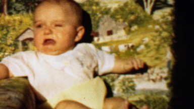 1957: Baby boy upset first crying angry upset pouty face.