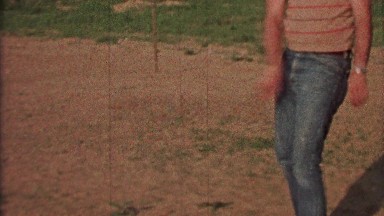 1968: Dad throws boy grounder baseball practice in farm country.