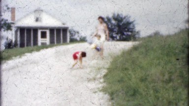 1952: Mom and Kids Heading Down to the Beach from Vacation Home