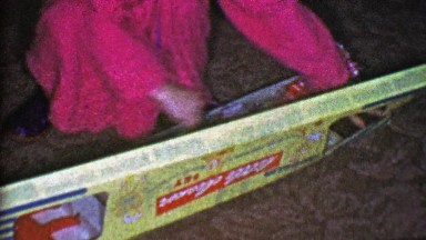 1953: Kid open candle gift set for holiday Christmas gift.