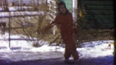 1954: Girl Ice Skating on Backyard Frozen Water Makeshift Rink.
