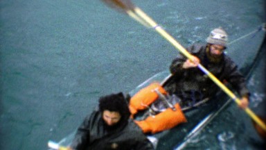 1974: Rugged Mountain Men Paddle Heavy Ocean Kayak to Dock