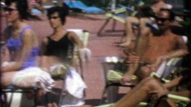 1963: Cute 60's Girl Poolside Sunbathing on Chaise Lounge Chair.
