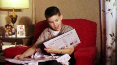 1964: Boy Unwraps Smothers Brothers and Burl Ives Albums