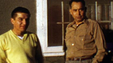 1957: Native Alaskan Son with Proud Father Makes Funny Face