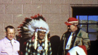 1957: Native American gifts white man special tribal peace blanket.