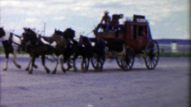 1959: Western stage coach ride rural countryside cowboy driver.