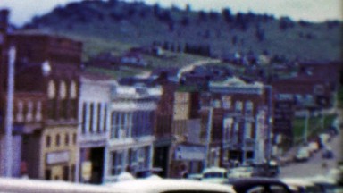 1959: Main Street Cottage Inn Cafe old mining small town.