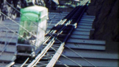 1959: Incline Railroad at Royal Gorge track small car inching along.