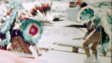 1959: Native American Indian dancers in traditional dress for tourists.
