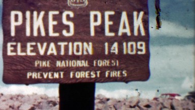 1959: Pikes Peak summit high elevation 14,109 sign family trip.