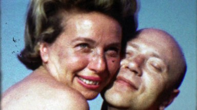 1963: Caucasian Lovers Embrace in Summertime Bikini Tops