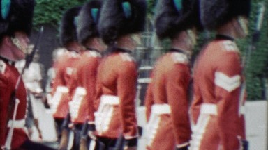 1963: Bearskin Royal British Queen's Guards Marching Like Toy Soldiers