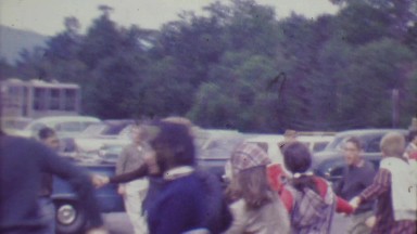 1964: Teenagers playing ring around the rosey game at Cog Railroad station.