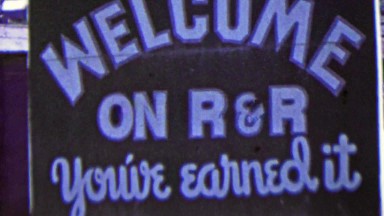 1951: Welcome on R&R You've Earned It Korean War military base.