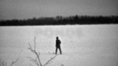 1937: Lone Man Venturing Into Winter Cold on Skis Without Poles