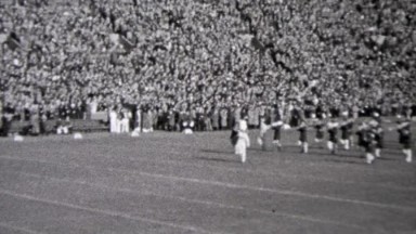 1937: Marching band at football game Minnesota versus Notre Dame football game.