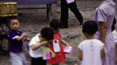 1951: Japanese school kids on field trip visit Nara Temple.