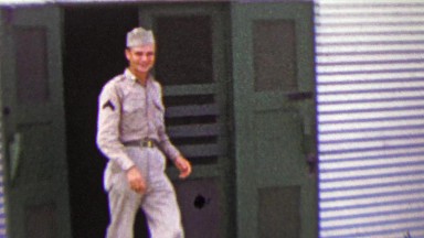 1951: US Military Man Exiting Army Services Club During R&R Trip.