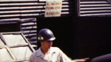 1951: US Army Man Entering Jeep Transport Vehicle During Korean War