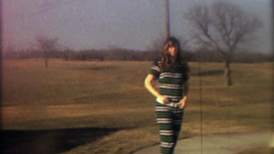 1967: Teenage Girl in Homemade Striped Green, White, and Black Jumpsuit
