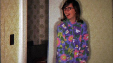 1967: Teenage Girl in Hippie Flower Patterned Homemade Purple Jumpsuit