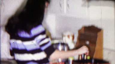 1968: College Student Teenage Girl Cooking Ground Beef in Modest Kitchen