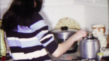 1968: College Student Teenager Making Over Cooked Sausage Pizza
