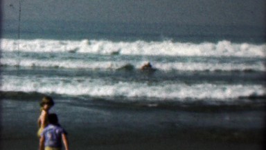1958: Women Early Boogie Board Style Body Surfing Inflatable Mattress