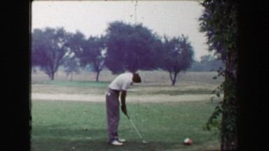 1968: Golfers Tee Off with Iron Club on Par 3 Hole as Sweetheart Girl Watches.