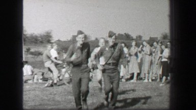1939: Track running sport star warmup pre-game practice preparations.