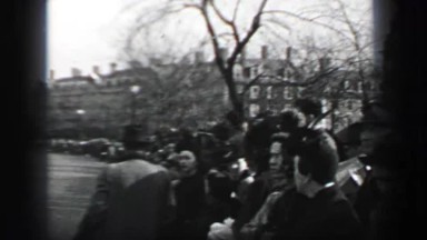 1937: Harvard University parade horsemen campus police leading charge.