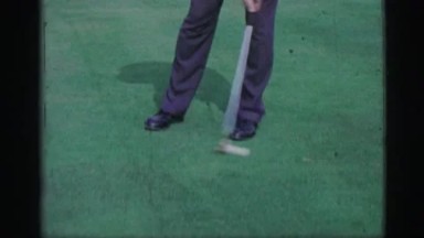 1968: Man Putting Golf Balls on Practice Green Bullseye Putter Club Cedar Rapids Iowa