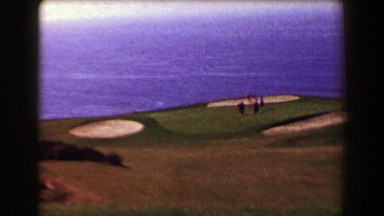 1967: Famous Pebble Beach golf course ocean views drought year dry brown grass.