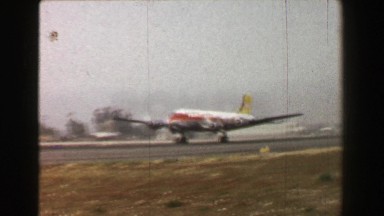 1967: Transocean Airline propeller airplane takeoff runway travel high speed.