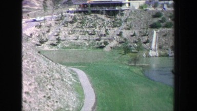 1968: Fancy golf course lined by large homes retention pond beauty. PALM
