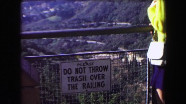 1969: Do Not Throw Trash Over Railing Sign Hollywood Hills Overlooking City