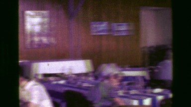 1977: Fancy Restaurant with Blue and White Striped Tablecloths and Floors