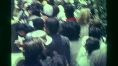 1977: Crowd of tourists queue bus for Machu Picchu Incan civilization epic