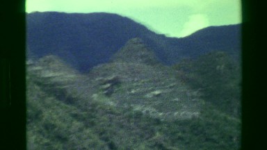 1977: Machu Picchu green forested mountains surrounding area river below. CUSCO,