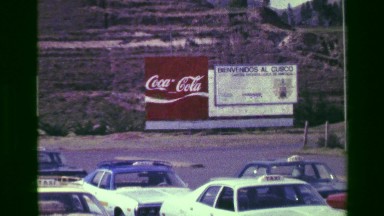 1977: Coca-Cola Sign at South American Airport Parking Lot Taxi Transport Row