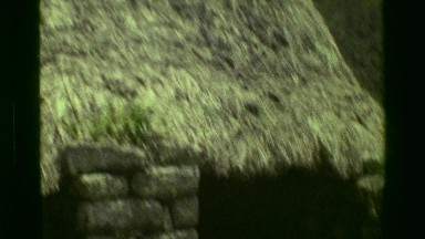 1977: Stone hut Machu Picchu native Inca civilization mountain clouds. CUSCO,
