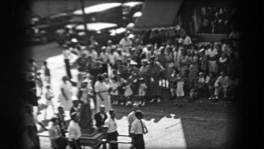 1938: Parade Marching Carrying Large Statue Down Middle of Street, Washington, DC
